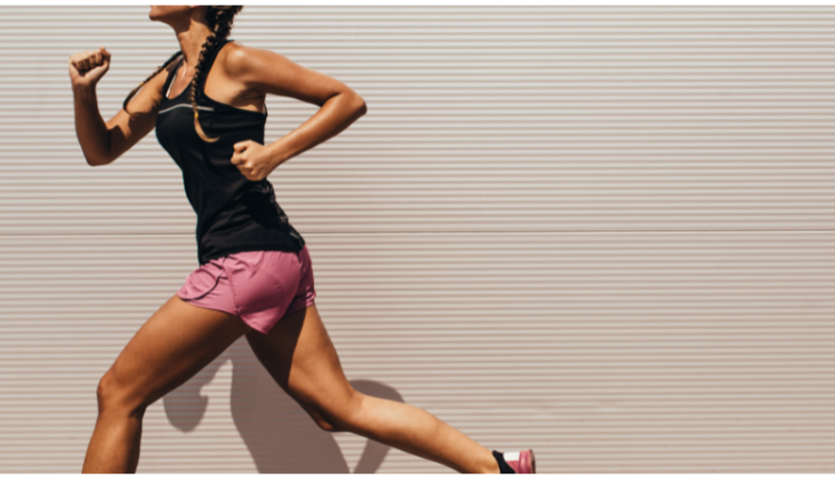 What Happens to Your Body When You Walk 10,000 Steps Per Day' - A women walking outdoors, enjoying a brisk walk, representing the benefits of achieving 10,000 steps daily for overall health and fitness.