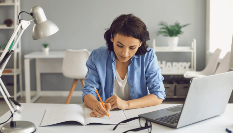 An illustration of a person typing on a laptop with money symbols flying out, representing making money online for beginners.