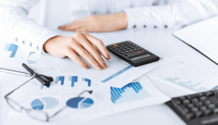 Image showing a calculator with highlighted MR, MC, M+, and M- buttons