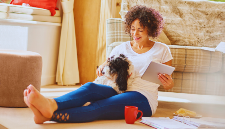 An image of a happy dog and cat sitting together with a pet insurance document and stethoscope in the foreground. The visual represents the concept of 'What Does Pet Insurance Cover,' highlighting the protection and care that pet insurance offers for vet bills, medical treatments, and emergencies.